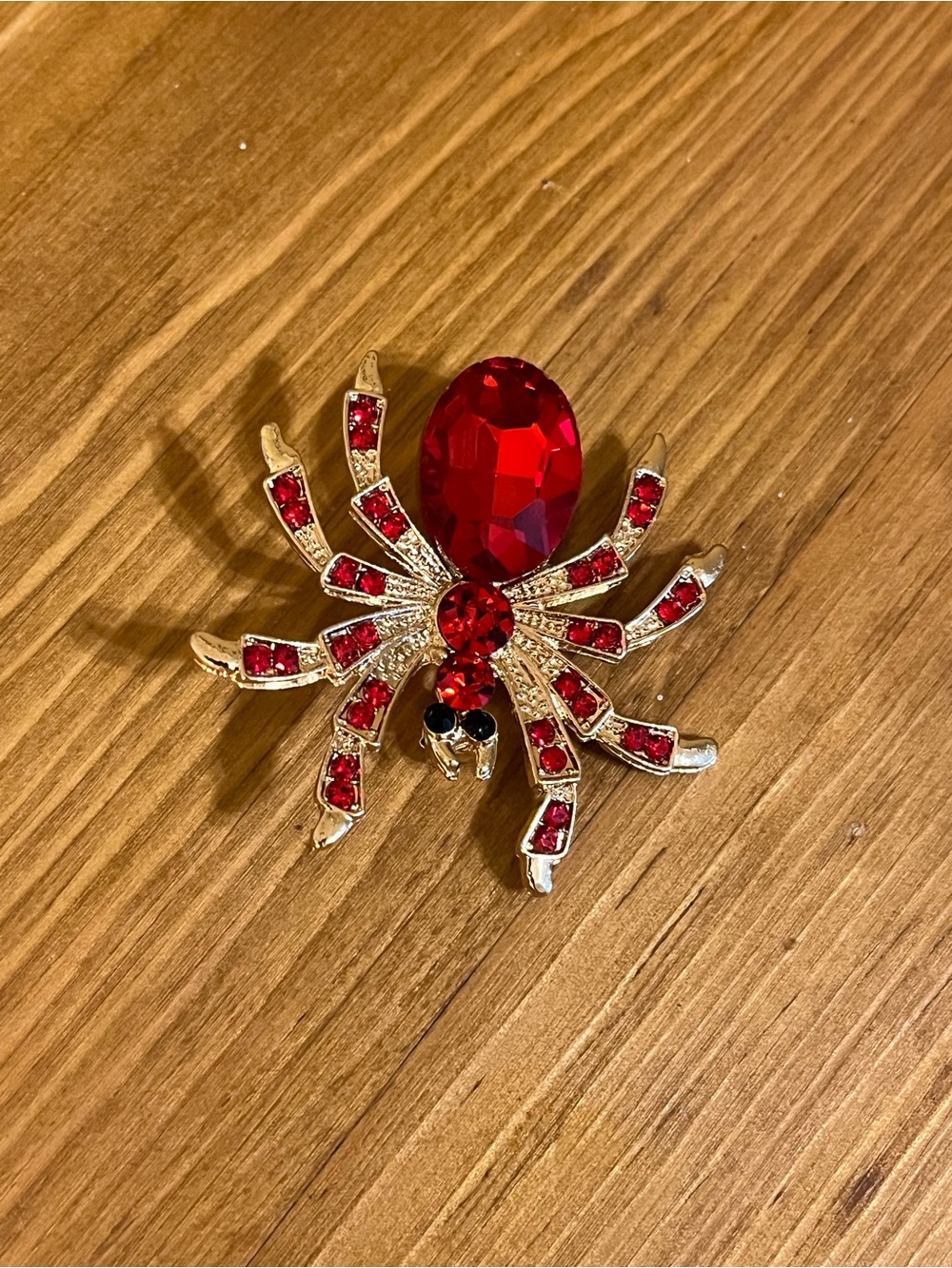 Red crystal spider with large red crystal rhinestones on gold tone 1 3/4”